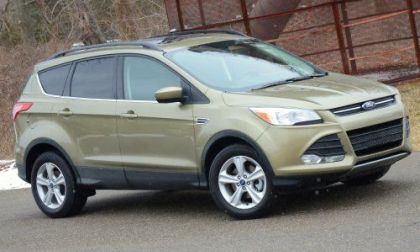 The side profile of the 2013 Ford Escape SE in Ginger Ale
