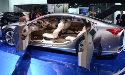 The side of the Hyundai HCD-14 Genesis Concept with the doors open.