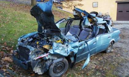 A wrecked Ford Tempo