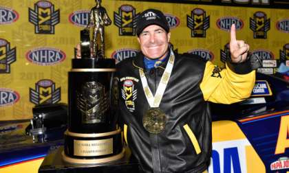 Ron Capps celebrates his 2016 NHRA championship