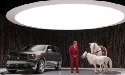 Ron Burgundy with the Dodge Durango and 2 horses