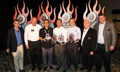 The 2013 SEMA Awards being handed to company reps.