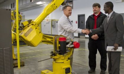 Dan Bednarzuk of Nissan Canton and faculty from Alcorn with robot