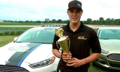 Ford NASCAR driver Trevor Bayne with EcoBoost MPG trophy
