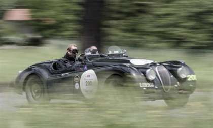 Sir Chris Hoy and Andy Wallace in a classic Jaguar XK120