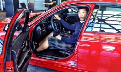 Earl Duque sitting in a 2012 BMW 3-Series