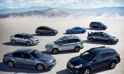 2014 Subaru Forester with entire Subaru lineup