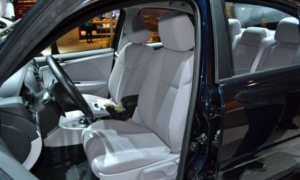 Driver-side open door of CODA Automotive EV at 2011 LA Auto Show