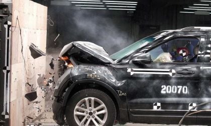 An Instrumented Test Vehicle Slams Into A Barrier During SUV Safety Testing