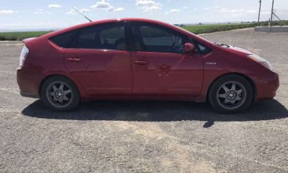 red second generation Toyota Prius 2007 