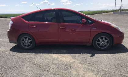 2007 Toyota Prius side shot red touring edition