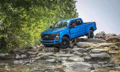 Ford F250 Tremor crawls down a rock pile.