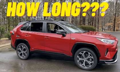 2021 Toyota RAV4 Prime XSE Supersonic Red profile view and front end