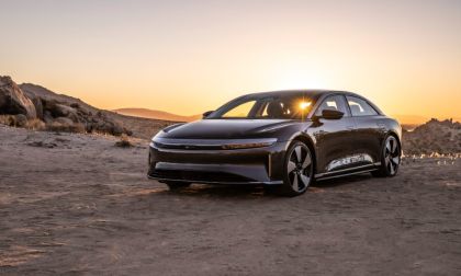 2022 Lucid Air electric luxury sedan shown from front three-quarter angle in desert landscape at sunset
