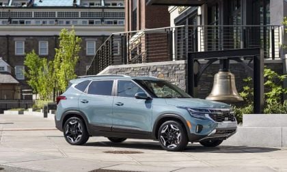 Light blue 2024 Kia Seltos in front of building