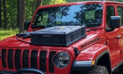 2025 Jeep JL Rubicon with a battery placed on the top of the hood