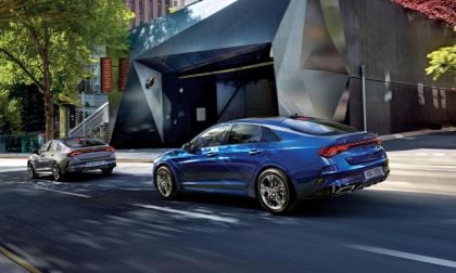 2025 Kia K5 group driving in the city