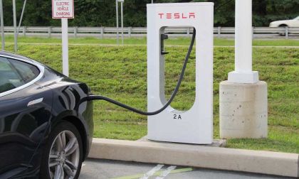 Subaru EV charging at a Tesla supercharger