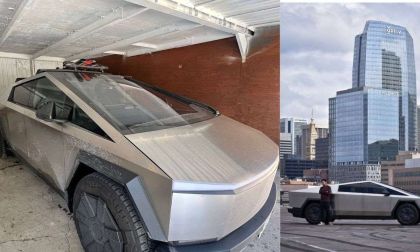 A Tesla Cybertruck parked in a garage, dusty and angular, next to an urban skyline featuring modern buildings.