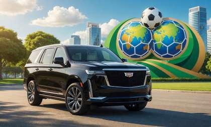 2026 Cadillac Escalade with 4,100 miles parked in front a FIFA World Cup sign in a city, rendition.