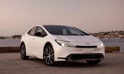 Front three-quarter view of 2026 Toyota Prius Limited showing LED headlights, grille, and hybrid design