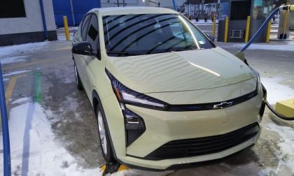 A 2027 Chevrolet Bolt looks great in a preproduction form charging in public