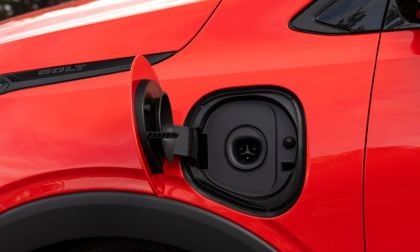 A 2027 Chevrolet Bolt is shown sporting a new NACS Tesla-style charger port