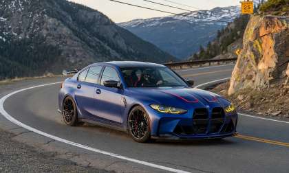 2027 BMW M3 driving in the mountains