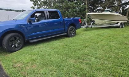 Ford F-150 Lightning towing a Chris Craft Launch 25 GTe electric boat