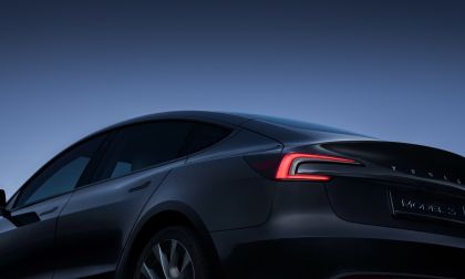 Gray Tesla Model 3 at Night