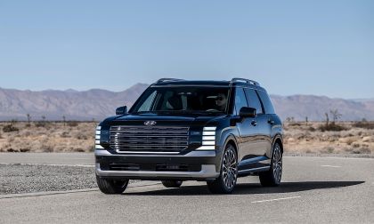 Hyundai Palisade SUV front view driving on desert highway