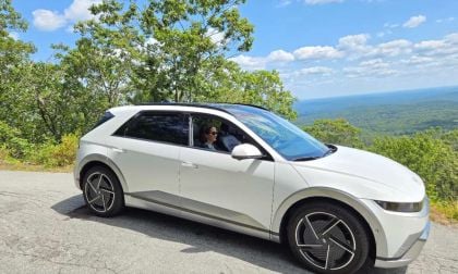 Image of white 2025 Hyundai Ioniq 5 Limited atop a mountain in New Hampshire with scenic Vista.