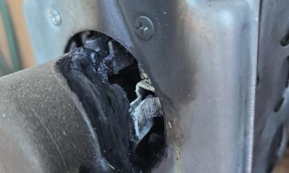 A mobile charger for a Chevy Bolt electric vehicle that has melted and burned is shown