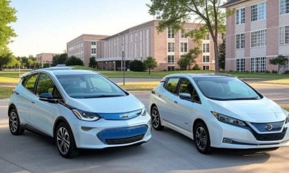 Nissan Leaf and a Chevrolet Bolt at a college campus