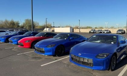 a group of Nissan Zs parked next ot each other 