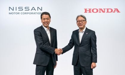 Nissan and Honda CEO Shaking Hands