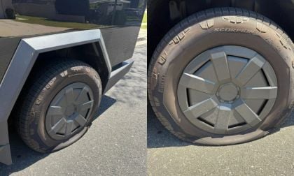 Cybertruck wheel with Scorpion flat tire, showing unique angular design and metallic finish