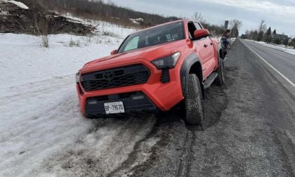Red Toyota Tundra Stuck on Road