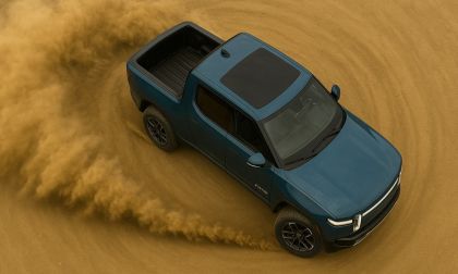 Rivian R1T performing a tank turn in dirt