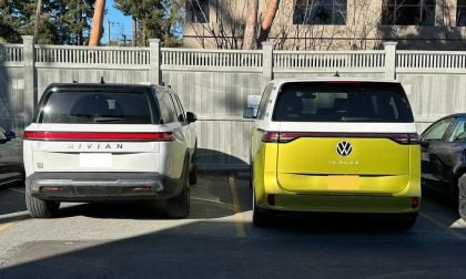 White Rivian R1s next to Yellow Volkswagen ID. Buzz