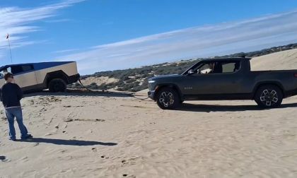Rivian R1t Pulling Tesla Cybertruck