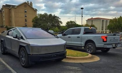 Tesla Cybertruck parked beside a Ford F-150 Lightning