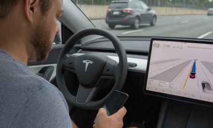 Tesla driver texting while using full self-driving