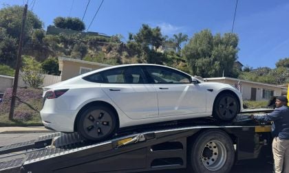 White Tesla Model 3 on Tow Truck