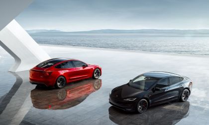 Two Tesla Model 3's in the colors Red And Black