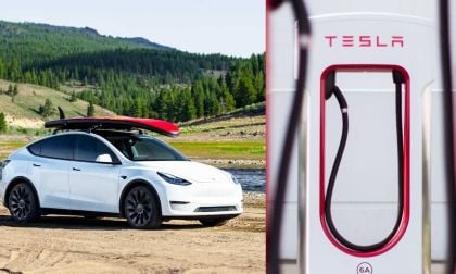 White Tesla Model Y next to Supercharger 