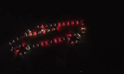 Tesla Owners Park In Shape of a Cybertruck and Perform Biggest Tesla Light Show