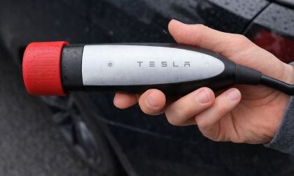 Tesla charge plug with protective end cap
