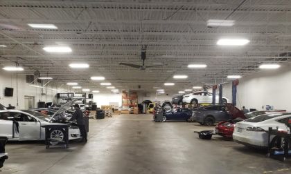 A busy Tesla service center repairs Tesla cars 
