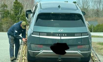 Tow truck is towing Judy's 2022 Hyundai Ioniq 5 to Bangor dealership